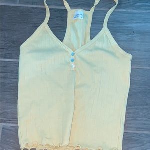 yellow tank top